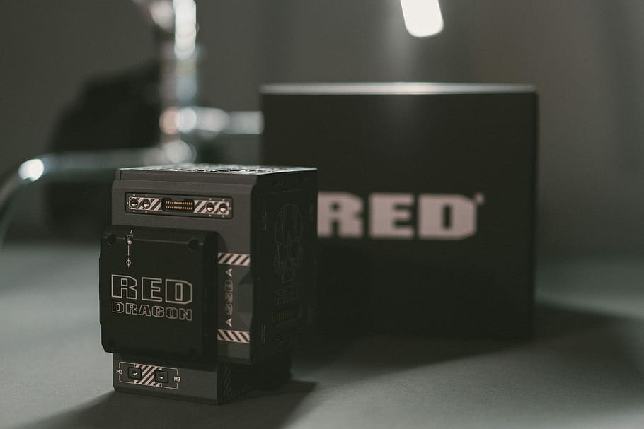closeup photo of RED labeled box, gray Red Dragon device with box HD wallpaper