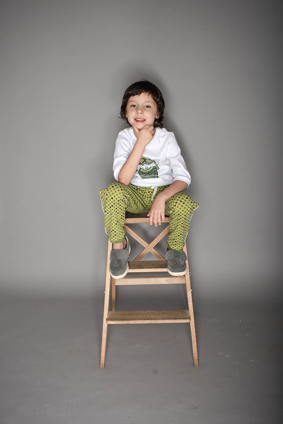 boy sitting on brown wooden chair, baby, cute, portrait, young
