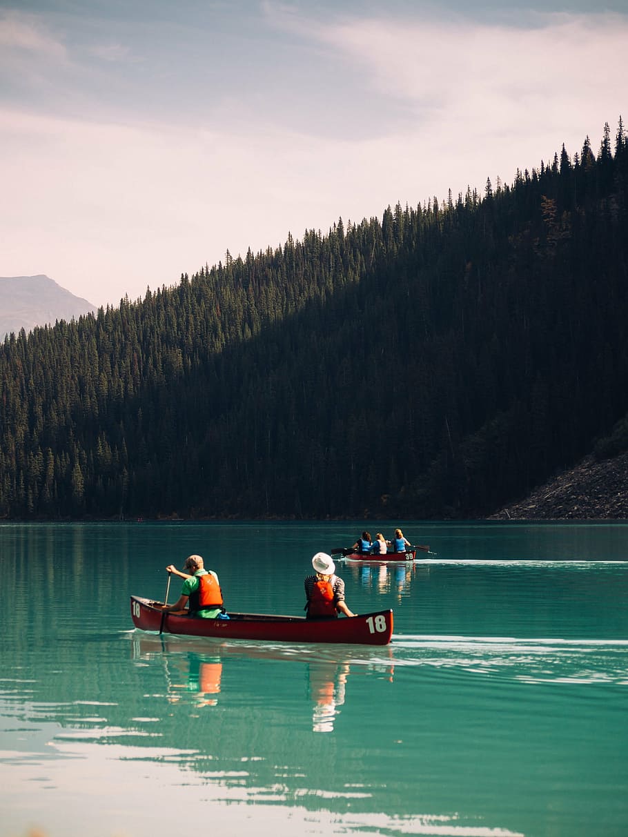 brown kayak boat on blue ocean water under gray sky, adventure HD wallpaper