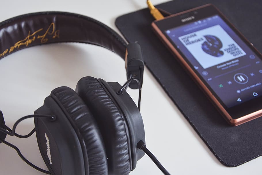 turned on smartphone near headset, cable, technology, music HD wallpaper