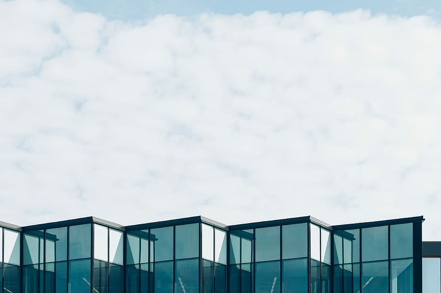 curtain wall building under cloud formation during daytime, blue glass building under clear sky HD wallpaper