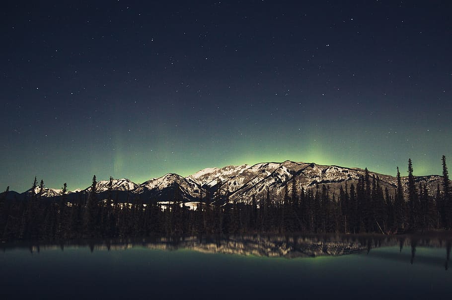 reflecting photography mountain, landscape photography of lake across mountain covered with snow with trees under stars HD wallpaper