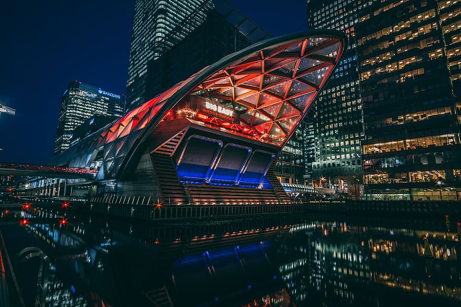 landscape photo of building, red and blue building during daytime HD wallpaper