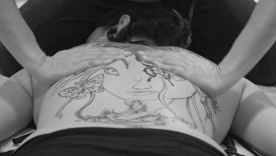 grayscale photo of person doing massage of a person lying on bed HD wallpaper