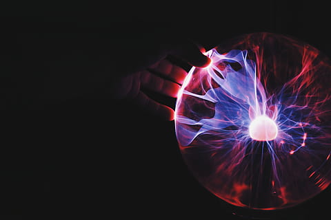 human hand holding plasma ball, person touching plasma ball, light HD wallpaper