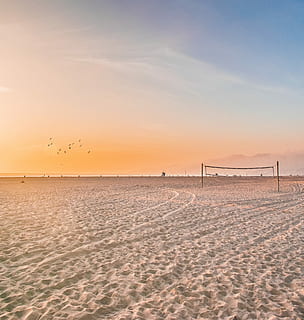 photo of volleyball net on sands, black post on gray sand, beach HD wallpaper
