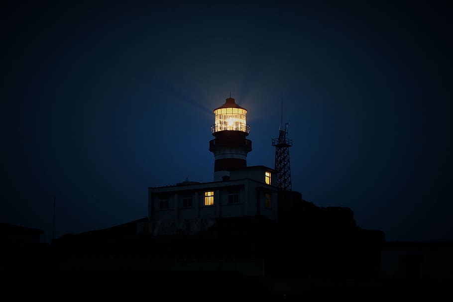 lighthouse during night time, turned on red and white lighthouse HD wallpaper
