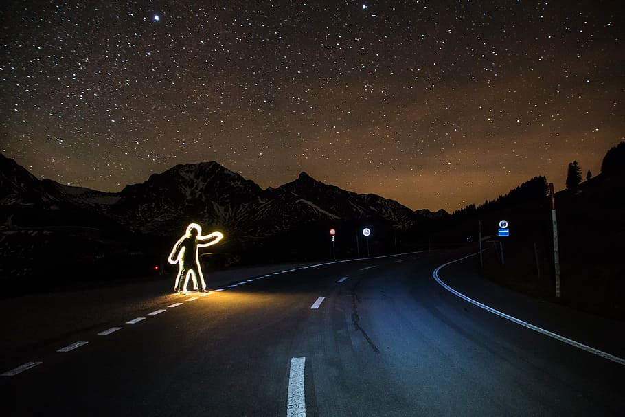 man crossing road time lapse photography, pickup, hitchhiker