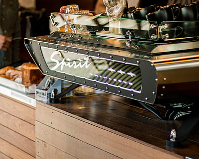 focus photography of Spirit Triplette machine on top of wooden counter, silver and black Spirit kitchen appliance HD wallpaper