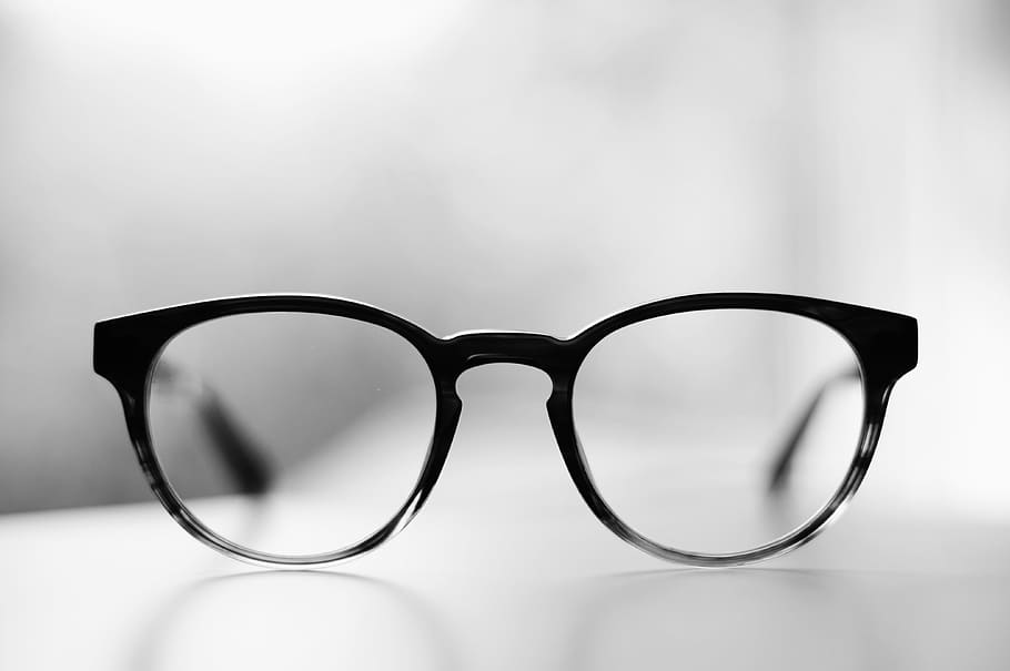 eyeglasses with black frames, selective focus photography of black framed eyeglasses