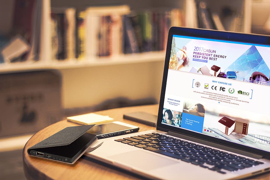 black laptop computer on table, pc, phone, powerbank, technology HD wallpaper