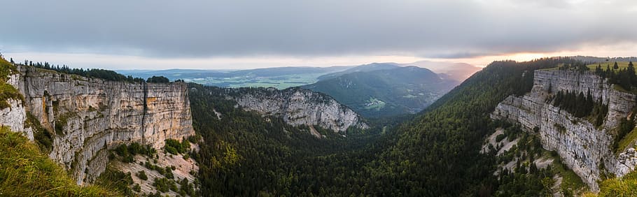 panoramic photo of mountains under cloudy sky, creux du van, canyon, HD wallpaper