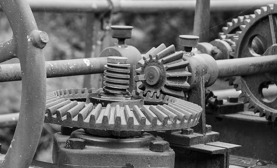 black metal engine part, gear, machinery, mechanism, rusty, iron