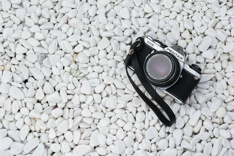 black and silver Pentax camera, pebbles, rocks, stones, directly above HD wallpaper