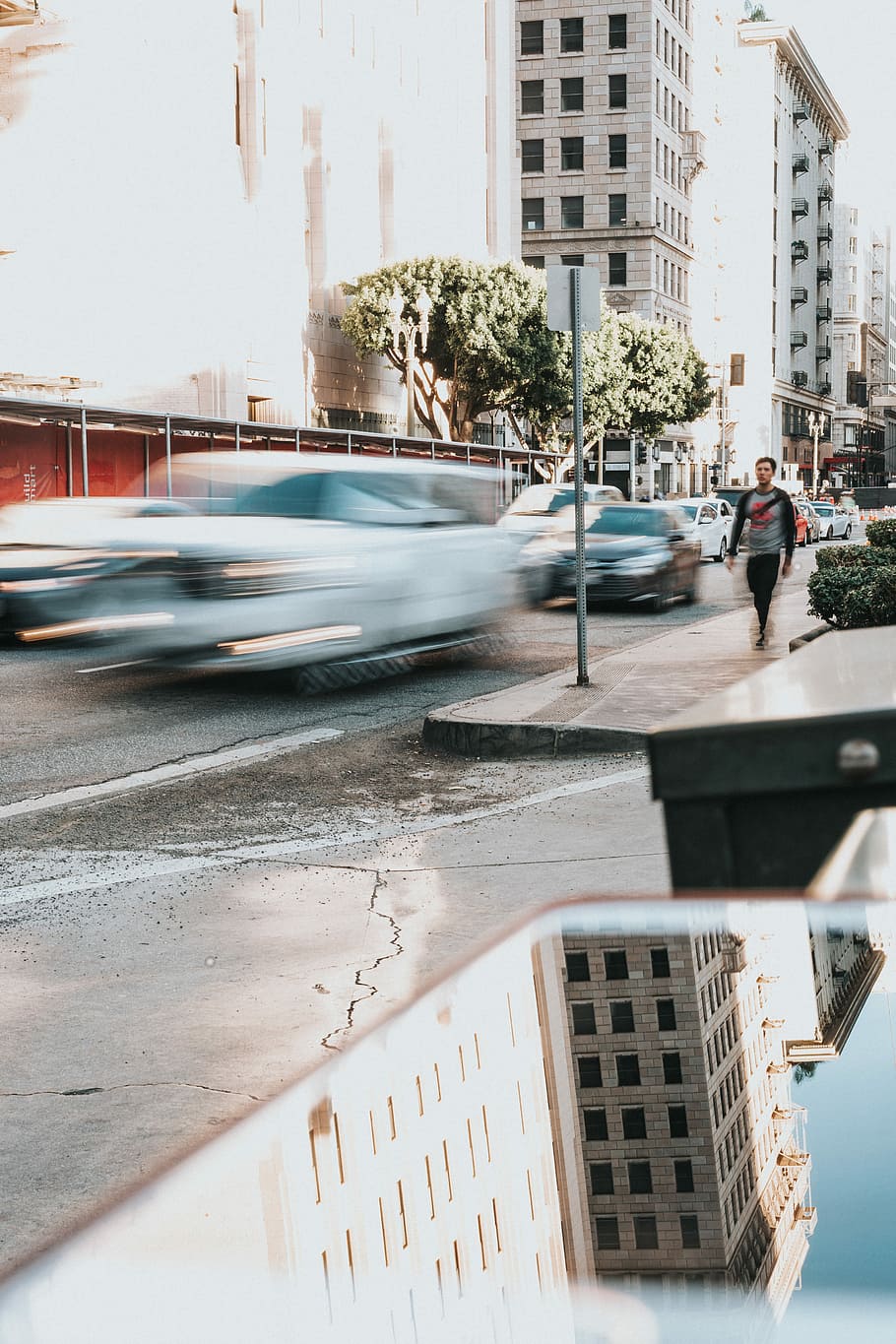 man walking on side walk near road with cars in time lapse photography, man walking beside the street HD wallpaper