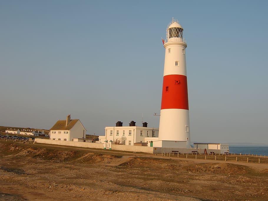lighthouse, sea, sunset, ocean, beach, marine, coast, nature HD wallpaper