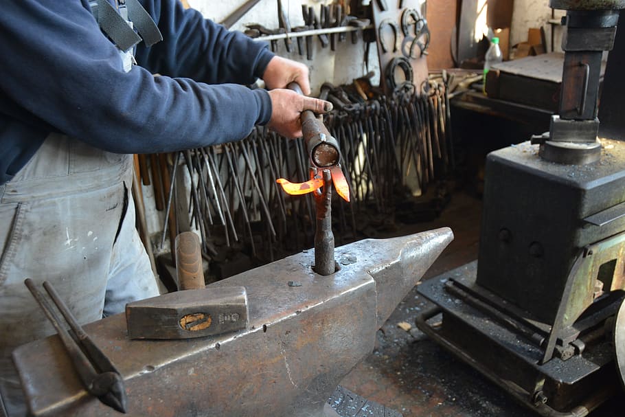 man using brown metal tool, craft, blacksmith, iron, hot, glow HD wallpaper
