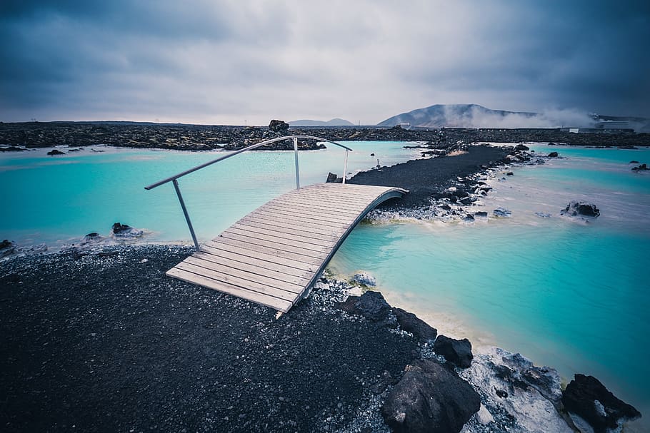 bridge over water, clouds, land formation, nature, overcast HD wallpaper