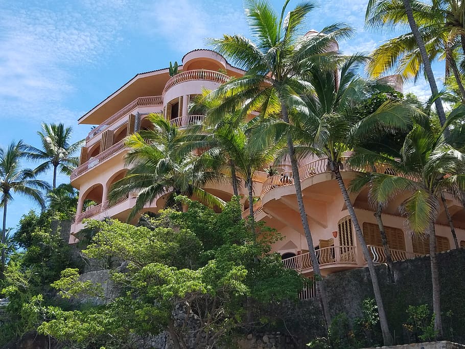 low angle photography of beige house, tropical, mansion, exotic