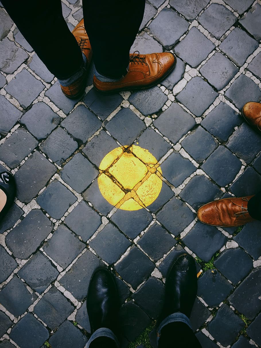 brown and black dress shoes, four people standing on blue and yellow clay brick surface HD wallpaper