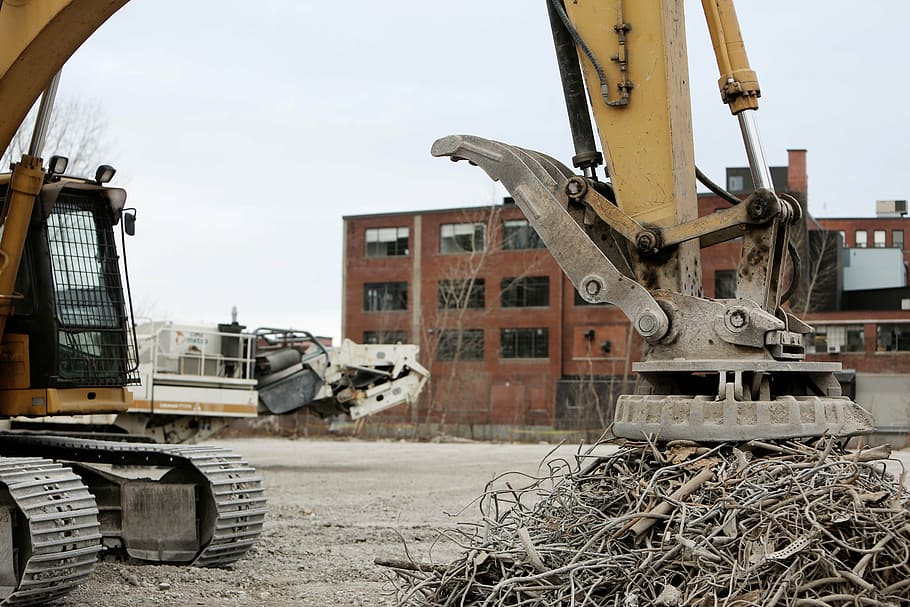yellow heavy equipment beside building, machine, metal, magnet HD wallpaper