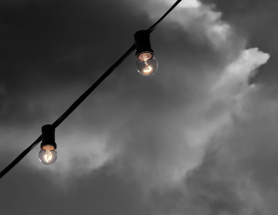 grayscale photography of two light bulbs, turned on black string lights HD wallpaper