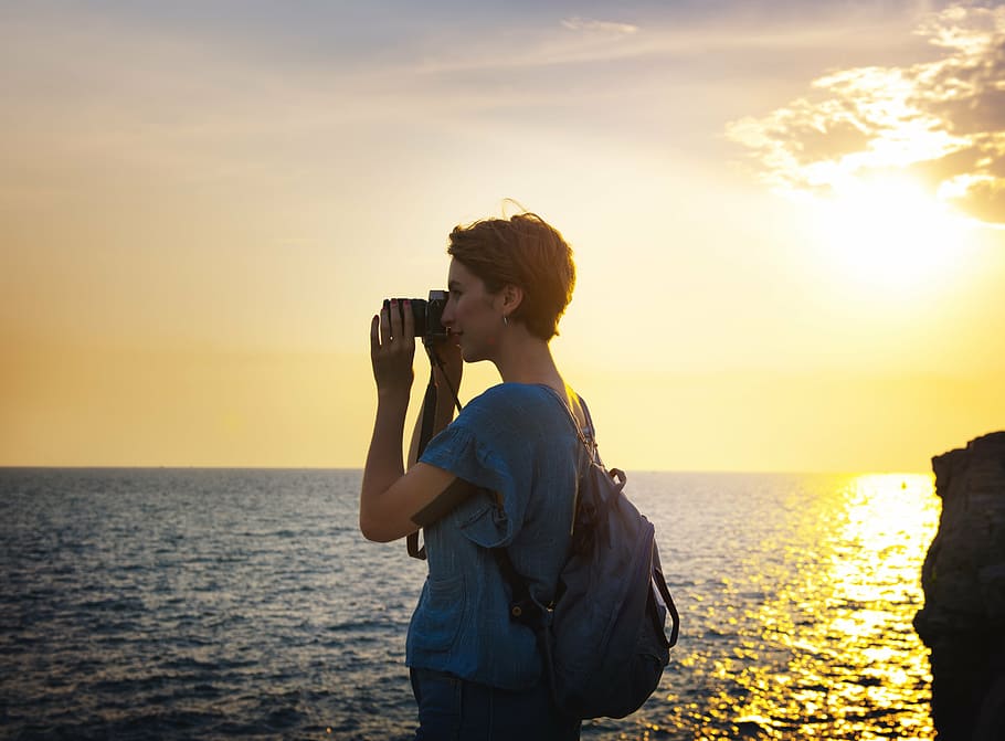 standing woman with blue shirt at sunset, activity, beach, beautiful HD wallpaper