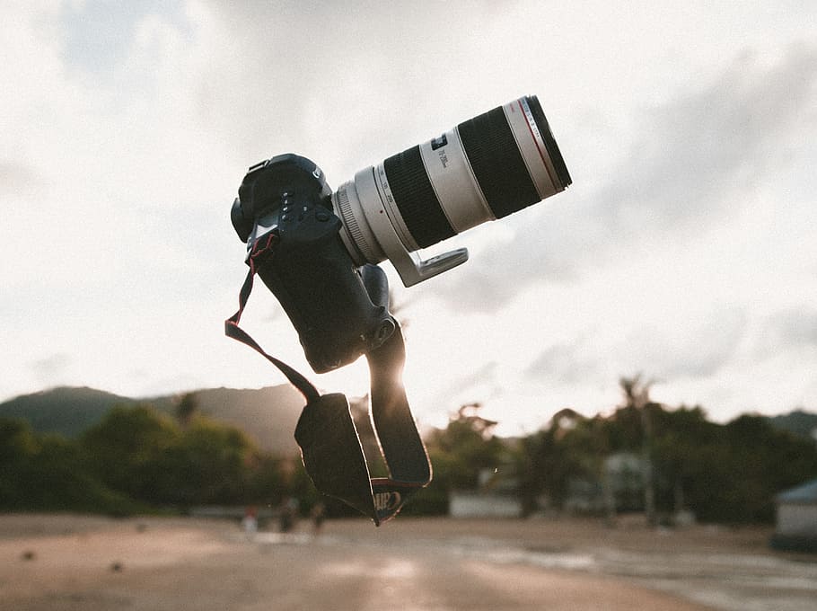 surrealism photo of white and black DSLR camera during golden hour, black and white DSLR camera HD wallpaper