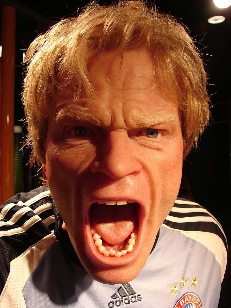 closeup photo of man wearing Adidas top open mouth, oliver kahn