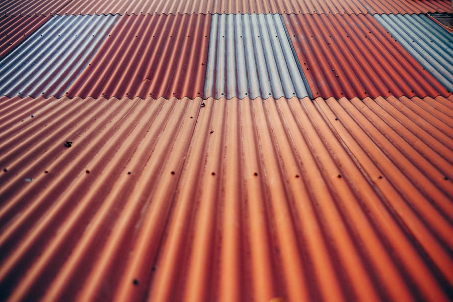 landscape photo of red and gray roof, orange iron sheet, corrugated iron