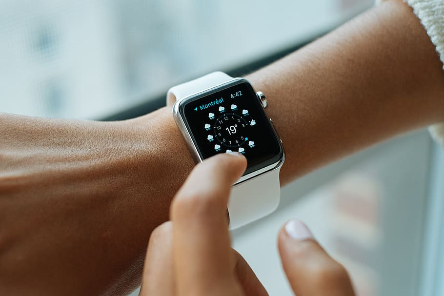 person wearing silver smartwatch, smart watch, apple, technology