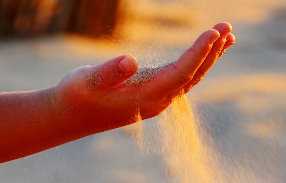 person with sand on hand, open, finger, rippling sand, sand trickling through fingers HD wallpaper