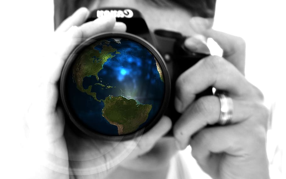 macro photography of man with DSLR camera with globe lens display, HD wallpaper