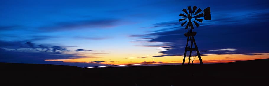 silhouette of windmill during golden hour, glow, in the evening HD wallpaper