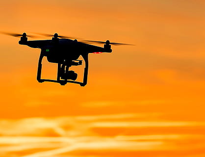 quadcopter drone, silhouette of black quadcopter drone flying above the ground HD wallpaper