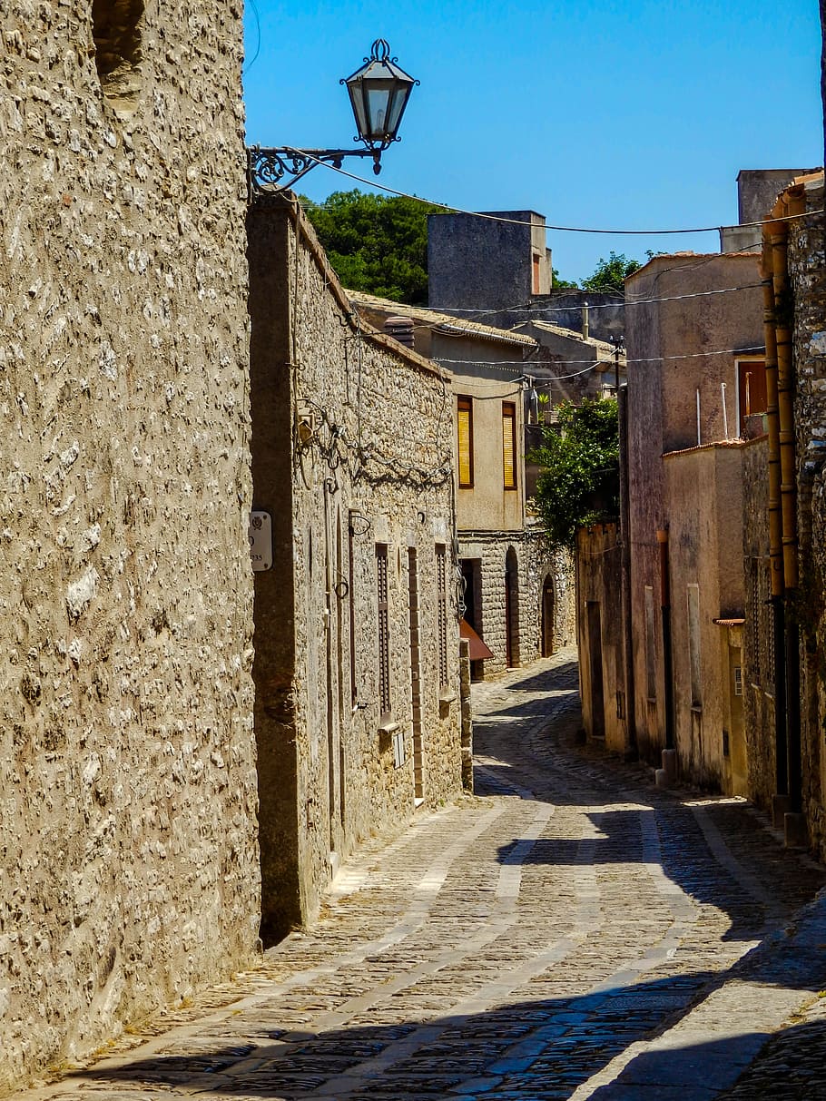 pathway between brown buildings, construction, monuments, landscape HD wallpaper