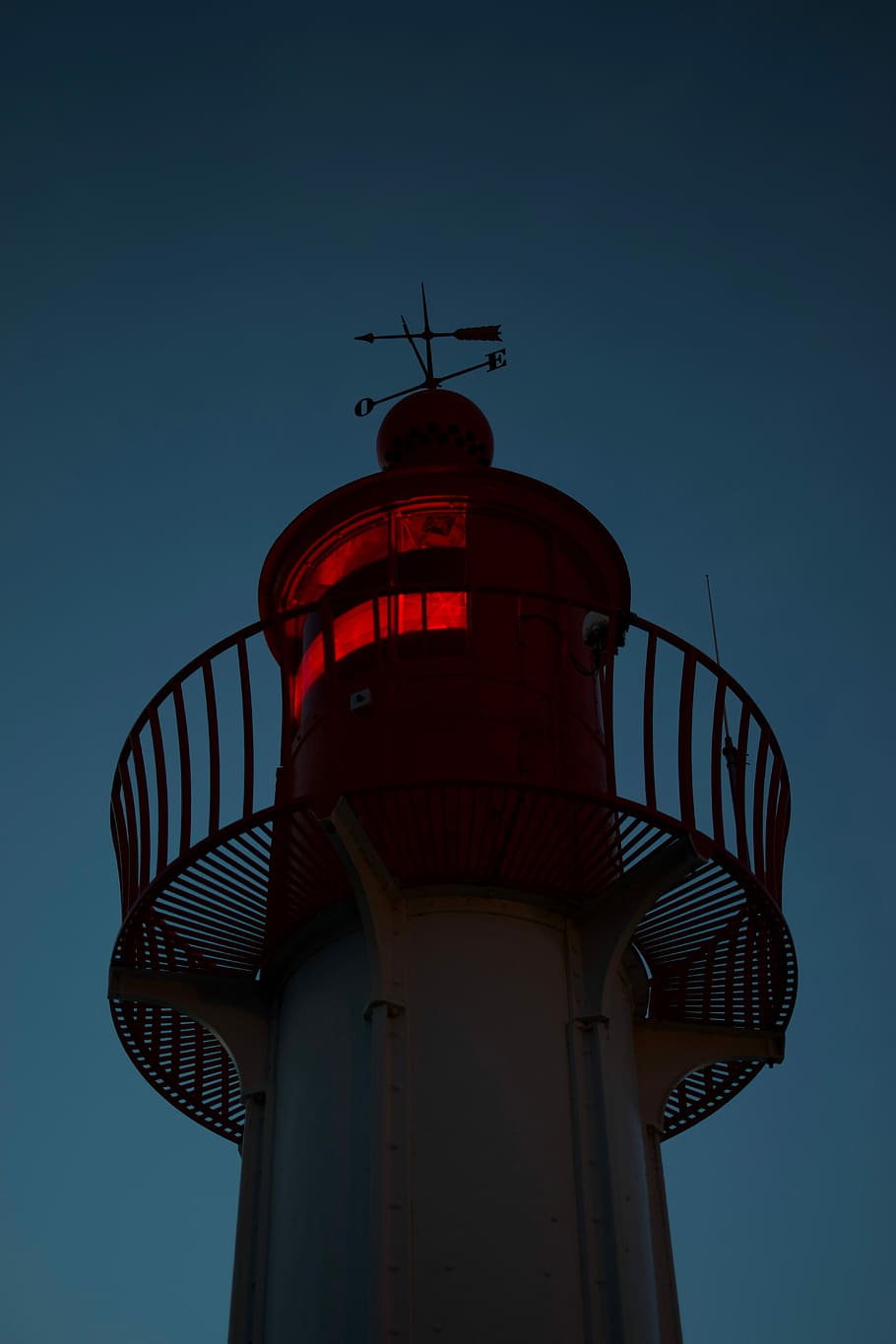 watchtower at night, lighthouse under clear blue sky, building