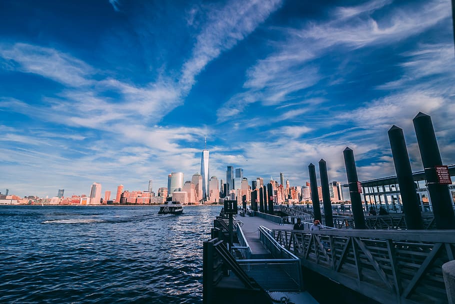 From Jersey City to Manhattan, photography of high-rise building near body of water HD wallpaper
