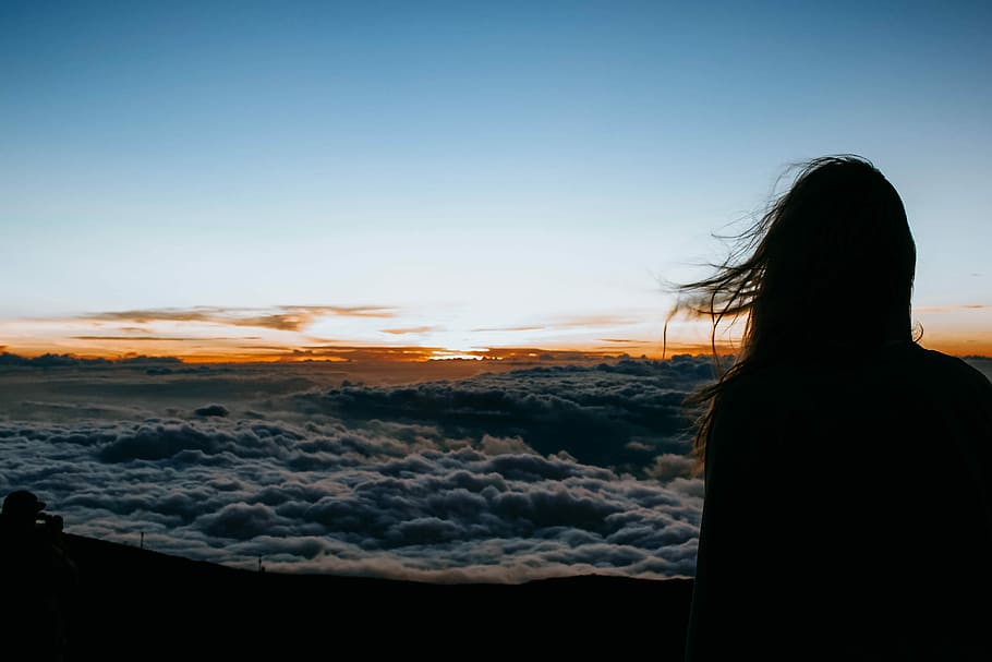 person overlooking clouds, silhouette of woman standing near sea of clouds HD wallpaper