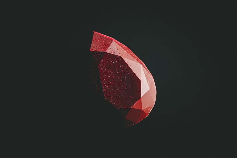 selective focus photography of faceted red gemstone, geometric red stone digital wallpaper HD wallpaper