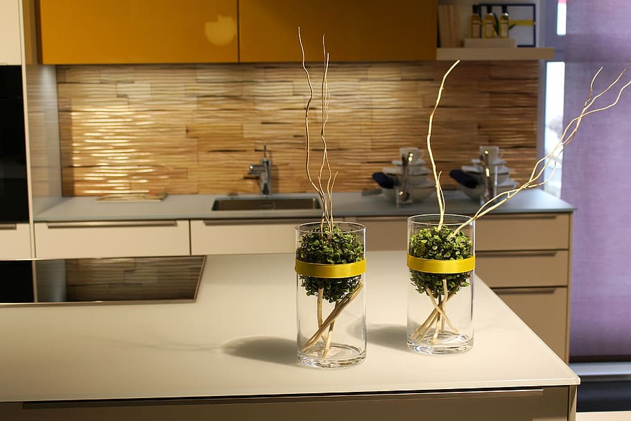 two brown twigs in clear glass vases on cupboard, kitchen, decoration HD wallpaper