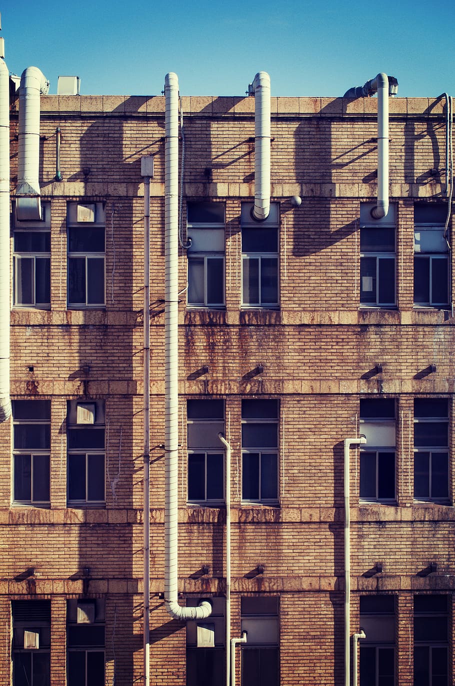 high angle photography of building, brown concrete brick building HD wallpaper