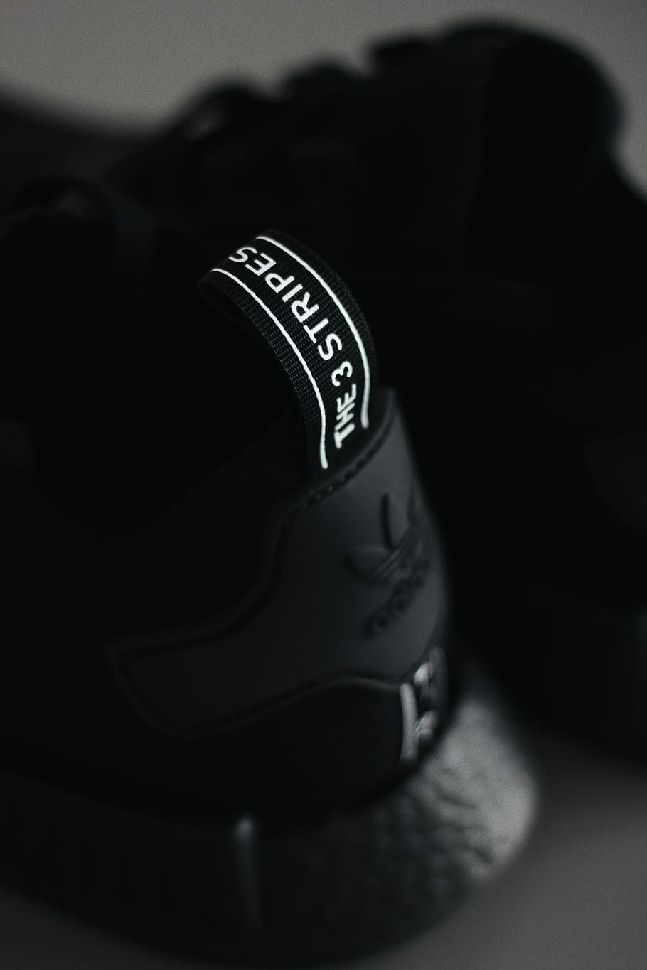 Not enough Thorns pencil HD wallpaper: selective focus photography of Adidas NMD shoe, closeup photo  of black adidas The 3 Stripe sneaker | Wallpaper Flare