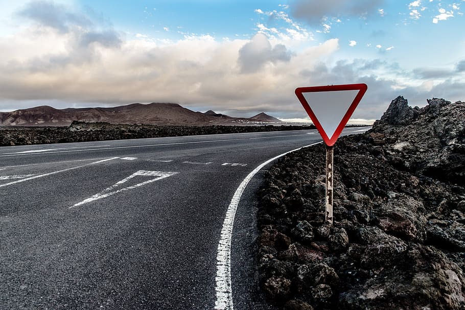 red and white road signage near road, yield, junction, confluence HD wallpaper