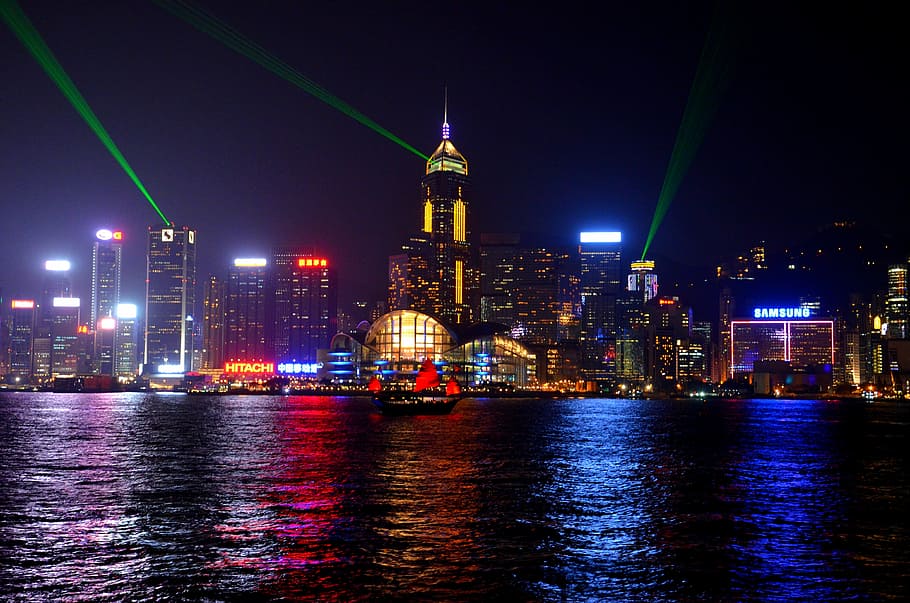photo of cruise ship near buildings, skyline, china, night, city