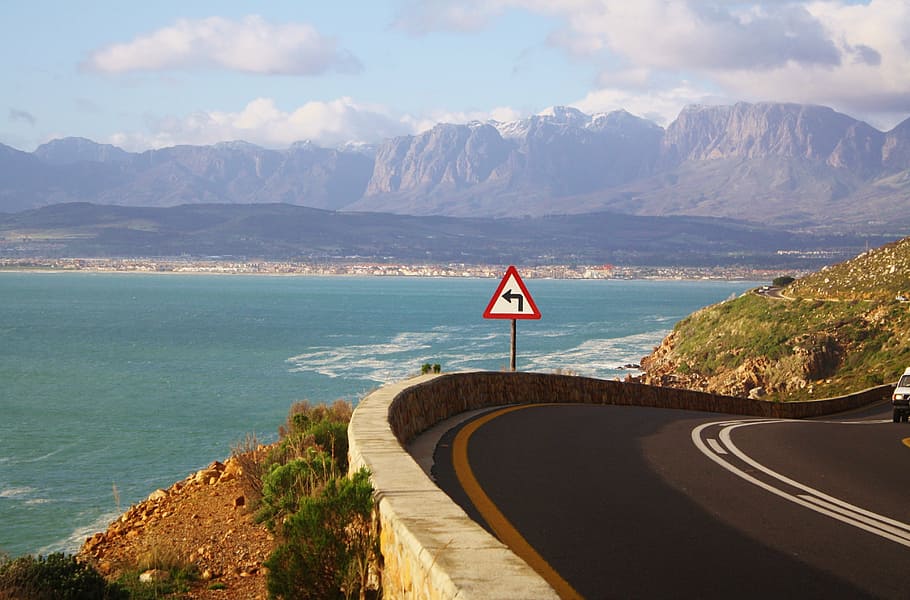 left turn road signage, cape town, south africa, coastal road