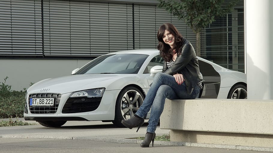 sitting woman in black leather jacket beside silver Audi sports coupe, HD wallpaper