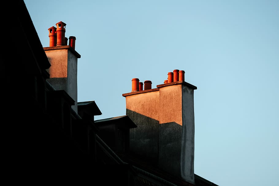 low angle photo of building, low-angle photography of chimney HD wallpaper