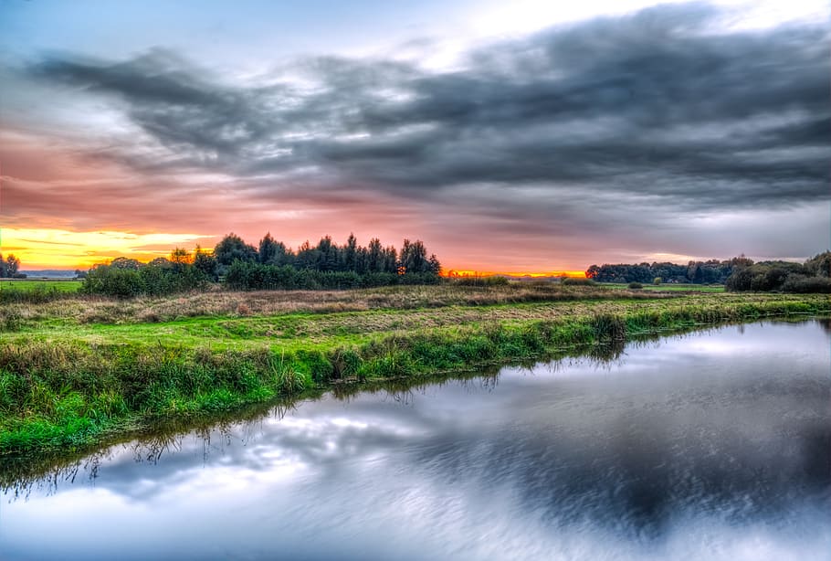 body of water near green grass during daytime, river, sunset HD wallpaper