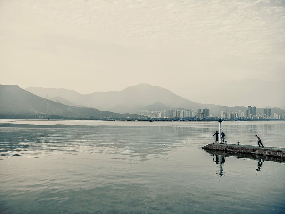 three person standing on concrete dock during daytime, silhouette HD wallpaper